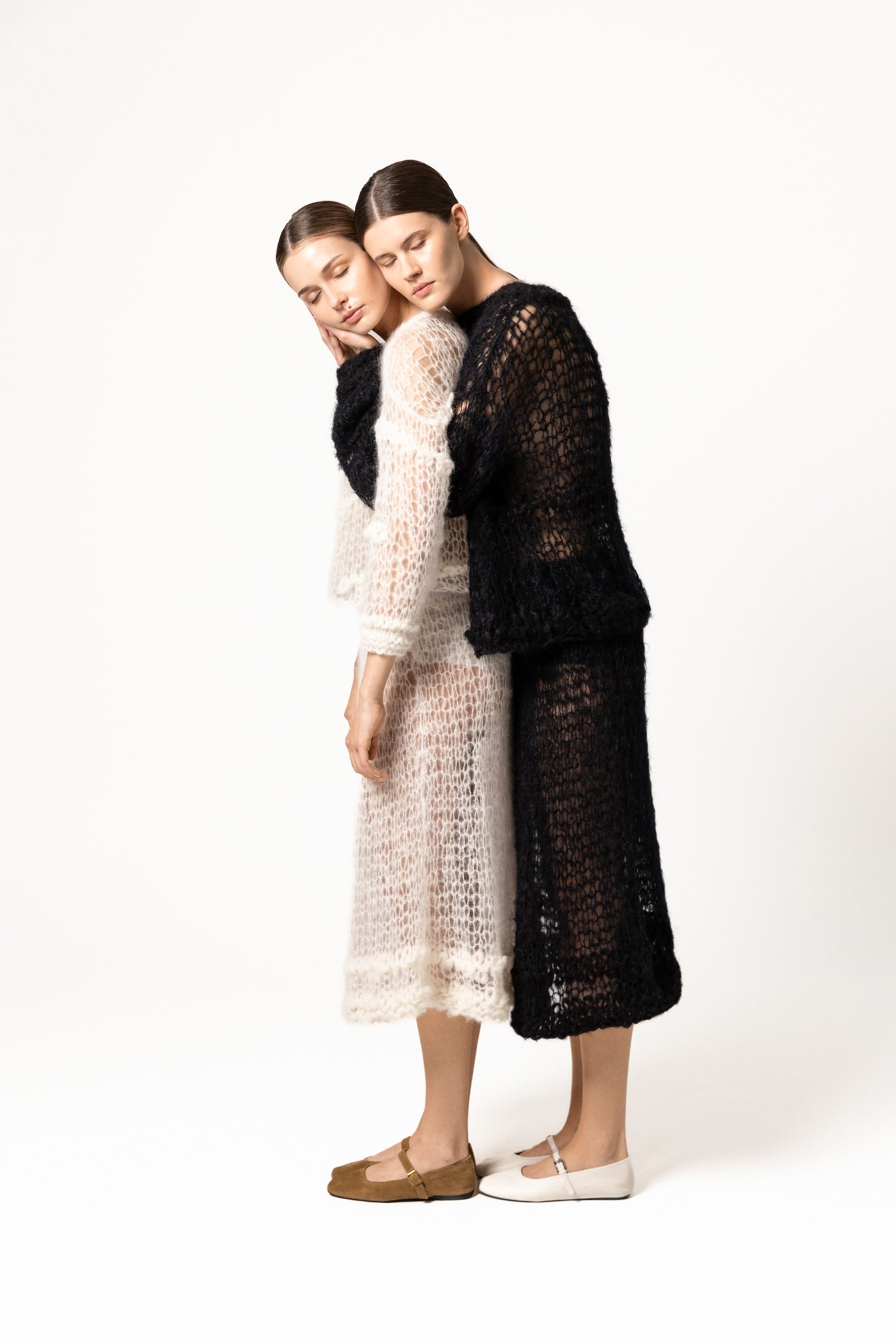 Libra black sweater and Libra white sweater